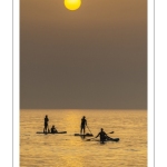 Paddle sur la plage de Cayeux-sur-mer au soleil couchant