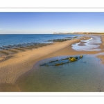 France, Pas-de-Calais (62), côte d'Opale, Grand site des deux caps, La plage de Tardinghen avec ses bouchots pour la culture des moules, le cap blanc-nez en arrière plan et l’épave du Lord Grey, ce chalutier britannique, long de 37 mètres, réquisitionné en 1915 par la Royal Navy et transformé en démineur, qui a sombré le 2 décembre 1917 lors d'une tempête  (Vue aérienne)// France, Pas-de-Calais (62), Opal Coast, Great site of the two capes, Tardinghen beach with its bouchots for mussel farming, the Cap Blanc-Nez in the background and the wreck of the Lord Grey, this 37-meter long British trawler, requisitioned in 1915 by the Royal Navy and transformed into a mine-clearer, which sank on December 2, 1917 during a storm (aerial view)