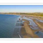 France, Pas-de-Calais (62), côte d'Opale, Grand site des deux caps, La plage de Tardinghen avec ses bouchots pour la culture des moules, le cap blanc-nez en arrière plan et l’épave du Lord Grey, ce chalutier britannique, long de 37 mètres, réquisitionné en 1915 par la Royal Navy et transformé en démineur, qui a sombré le 2 décembre 1917 lors d'une tempête // France, Pas-de-Calais (62), Opal Coast, Great site of the two capes, Tardinghen beach with its bouchots for mussel farming, the Cap Blanc-Nez in the background and the wreck of the Lord Grey, this 37-meter long British trawler, requisitioned in 1915 by the Royal Navy and transformed into a mine-clearer, which sank on December 2, 1917 during a storm.