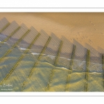 France, Pas-de-Calais (62), côte d'Opale, Grand site des deux caps, La plage de Tardinghen avec ses bouchots pour la culture des moules, le cap blanc-nez en arrière plan et l’épave du Lord Grey, ce chalutier britannique, long de 37 mètres, réquisitionné en 1915 par la Royal Navy et transformé en démineur, qui a sombré le 2 décembre 1917 lors d'une tempête  (Vue aérienne)// France, Pas-de-Calais (62), Opal Coast, Great site of the two capes, Tardinghen beach with its bouchots for mussel farming, the Cap Blanc-Nez in the background and the wreck of the Lord Grey, this 37-meter long British trawler, requisitioned in 1915 by the Royal Navy and transformed into a mine-clearer, which sank on December 2, 1917 during a storm (aerial view)