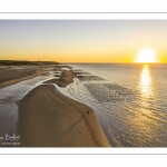 France, Pas-de-Calais (62), côte d'Opale, Grand site des deux caps, La plage de Tardinghen, ses bouchots pour la culture des moules, le cap Gris-nez en arrière plan au soleil couchant et l’épave du Lord Grey, ce chalutier britannique, long de 37 mètres, réquisitionné en 1915 par la Royal Navy et transformé en démineur, qui a sombré le 2 décembre 1917 lors d'une tempête  (Vue aérienne) // France, Pas-de-Calais (62), Opal Coast, Great site of the two capes, the beach of Tardinghen, its bouchots for the culture of mussels, the Cap Gris-nez in the background at sunset and the wreck of the Lord Grey, this British trawler, 37 meters long, requisitioned in 1915 by the Royal Navy and transformed into a mine-clearer, which sank on December 2, 1917 during a storm (aerial view)