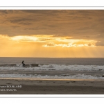 Paddle le long de la plage de Fort-Mahon au crépuscule