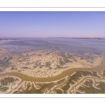 France, Somme (80), Baie de Somme, Saint-Valery-sur-Somme, Cap Hornu, les mollières envahies par la mer lors des grandes marées, les chenaux et les mares des huttes de chasse sont alors bien visibles (vue aérienne) // France, Somme (80), Somme Bay, Saint-Valery-sur-Somme, Cape Hornu, the salted meadows invaded by the sea during high tides, the channels and the ponds of hunting huts are then clearly visible (aerial view)