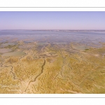 France, Somme (80), Baie de Somme, Saint-Valery-sur-Somme, Cap Hornu, les mollières envahies par la mer lors des grandes marées, les chenaux et les mares des huttes de chasse sont alors bien visibles (vue aérienne) // France, Somme (80), Somme Bay, Saint-Valery-sur-Somme, Cape Hornu, the salted meadows invaded by the sea during high tides, the channels and the ponds of hunting huts are then clearly visible (aerial view)