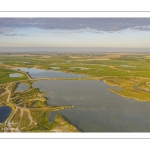 France, Somme (80), Baie de Somme, Cayeux-sur-mer, Ault, Le Hâble d'Ault, cet ancien port est devenu un polder protégé de la mer par le cordon de galets qui forme une digue  (vue aérienne) // France, Somme (80), Baie de Somme, Cayeux-sur-mer, Ault, Le Hâble d'Ault, this old port has become a polder protected from the sea by the pebble cord that forms a dike.  (aerial view)