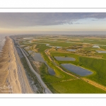 France, Somme (80), Baie de Somme, Cayeux-sur-mer, Ault, Le Hâble d'Ault, cet ancien port est devenu un polder protégé de la mer par le cordon de galets qui forme une digue  (vue aérienne) // France, Somme (80), Baie de Somme, Cayeux-sur-mer, Ault, Le Hâble d'Ault, this old port has become a polder protected from the sea by the pebble cord that forms a dike.  (aerial view)