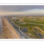 France, Somme (80), Baie de Somme, Cayeux-sur-mer, Ault, Le Hâble d'Ault, cet ancien port est devenu un polder protégé de la mer par le cordon de galets qui forme une digue  (vue aérienne) // France, Somme (80), Baie de Somme, Cayeux-sur-mer, Ault, Le Hâble d'Ault, this old port has become a polder protected from the sea by the pebble cord that forms a dike.  (aerial view)