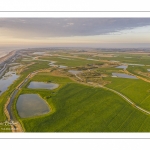 France, Somme (80), Baie de Somme, Cayeux-sur-mer, Ault, Le Hâble d'Ault, cet ancien port est devenu un polder protégé de la mer par le cordon de galets qui forme une digue  (vue aérienne) // France, Somme (80), Baie de Somme, Cayeux-sur-mer, Ault, Le Hâble d'Ault, this old port has become a polder protected from the sea by the pebble cord that forms a dike.  (aerial view)