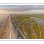 France, Somme (80), Baie de Somme, Cayeux-sur-mer, Ault, Le Hâble d'Ault, cet ancien port est devenu un polder protégé de la mer par le cordon de galets qui forme une digue  (vue aérienne) // France, Somme (80), Baie de Somme, Cayeux-sur-mer, Ault, Le Hâble d'Ault, this old port has become a polder protected from the sea by the pebble cord that forms a dike.  (aerial view)