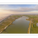 France, Somme (80), Baie de Somme, Cayeux-sur-mer, Ault, Le Hâble d'Ault, cet ancien port est devenu un polder protégé de la mer par le cordon de galets qui forme une digue  (vue aérienne) // France, Somme (80), Baie de Somme, Cayeux-sur-mer, Ault, Le Hâble d'Ault, this old port has become a polder protected from the sea by the pebble cord that forms a dike.  (aerial view)