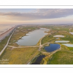 France, Somme (80), Baie de Somme, Cayeux-sur-mer, Ault, Le Hâble d'Ault, cet ancien port est devenu un polder protégé de la mer par le cordon de galets qui forme une digue  (vue aérienne) // France, Somme (80), Baie de Somme, Cayeux-sur-mer, Ault, Le Hâble d'Ault, this old port has become a polder protected from the sea by the pebble cord that forms a dike.  (aerial view)