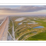 France, Somme (80), Baie de Somme, Cayeux-sur-mer, Ault, Le Hâble d'Ault, cet ancien port est devenu un polder protégé de la mer par le cordon de galets qui forme une digue  (vue aérienne) // France, Somme (80), Baie de Somme, Cayeux-sur-mer, Ault, Le Hâble d'Ault, this old port has become a polder protected from the sea by the pebble cord that forms a dike.  (aerial view)