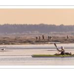 Kayakiste à marée basse en baie de Somme