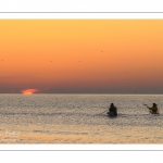 Pêcheurs au haveneau au soleil couchant