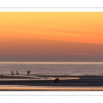 Pêcheurs au haveneau au soleil couchant