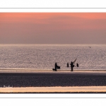 Pêcheurs au haveneau au soleil couchant